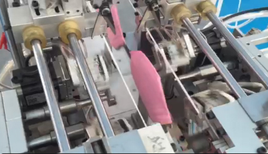 Folding point belt machine